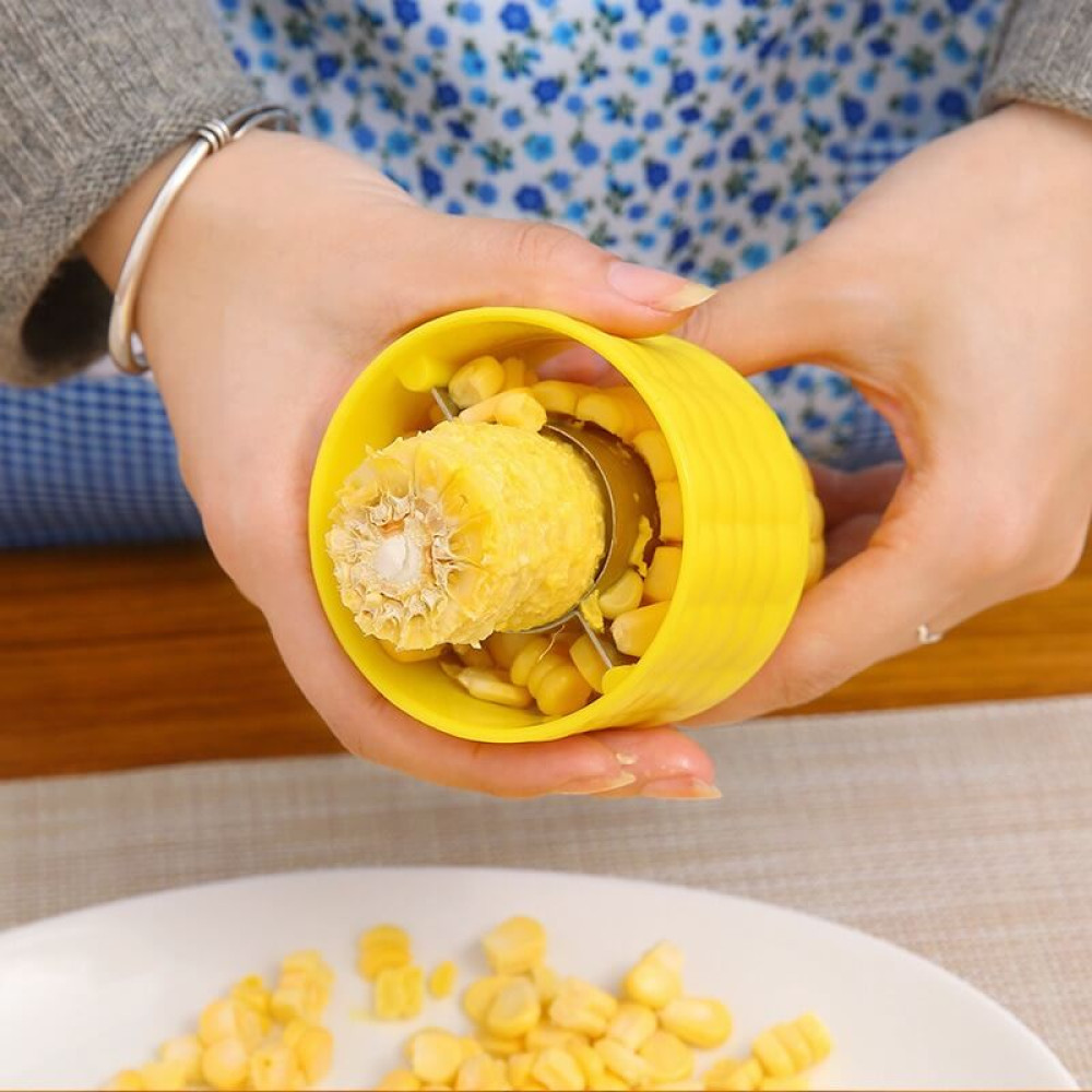 Пристрій для чищення кукурудзи жовтого кольору